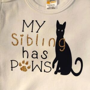 My sibling has paws onsie